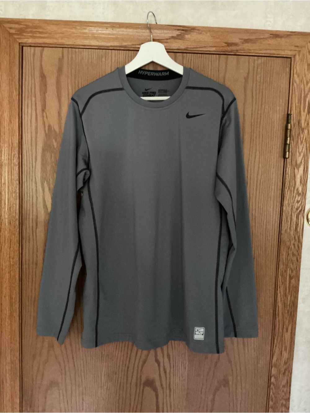 NWOT - Nike Pro Combat Hyperwarm Fitted Long Sleeve Top. Gray with Black Swoosh